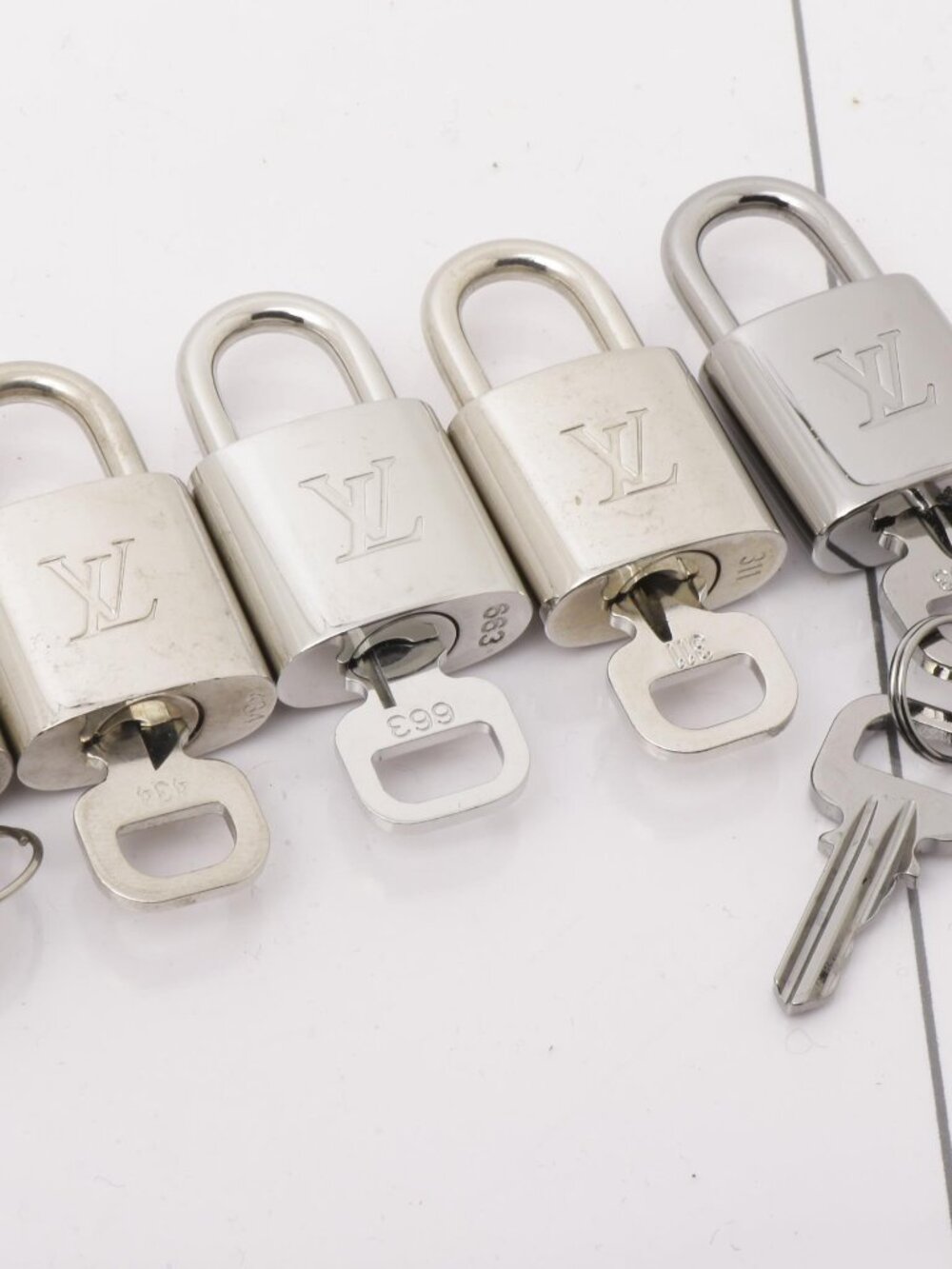 LV Silver Lock & Key (random #)